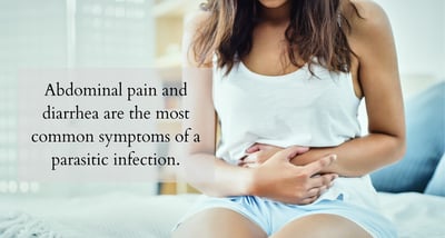 Woman holding stomach pain